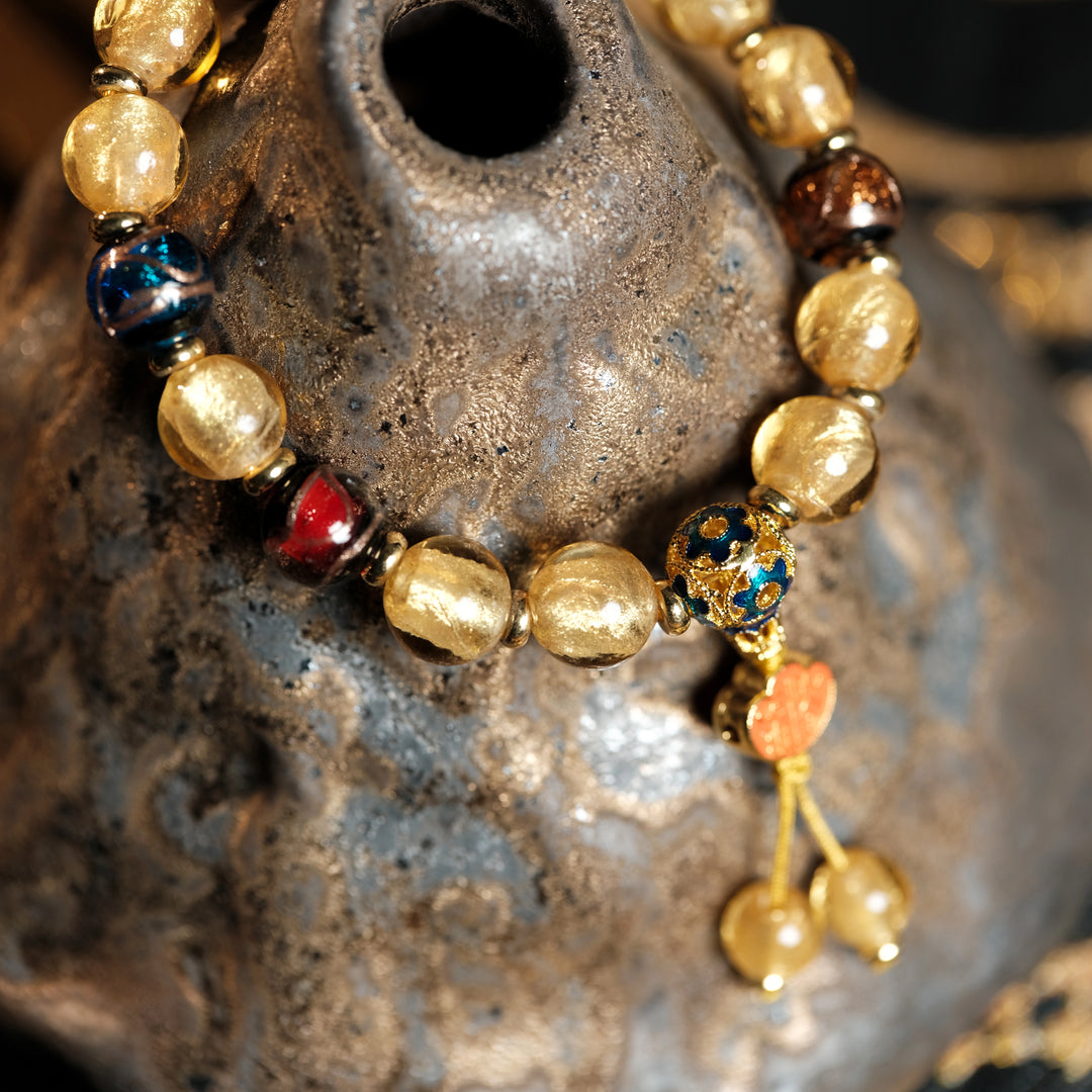 Radiant Wealth & Eternal Abundance — Luminous Golden Prosperity Charm Bracelet