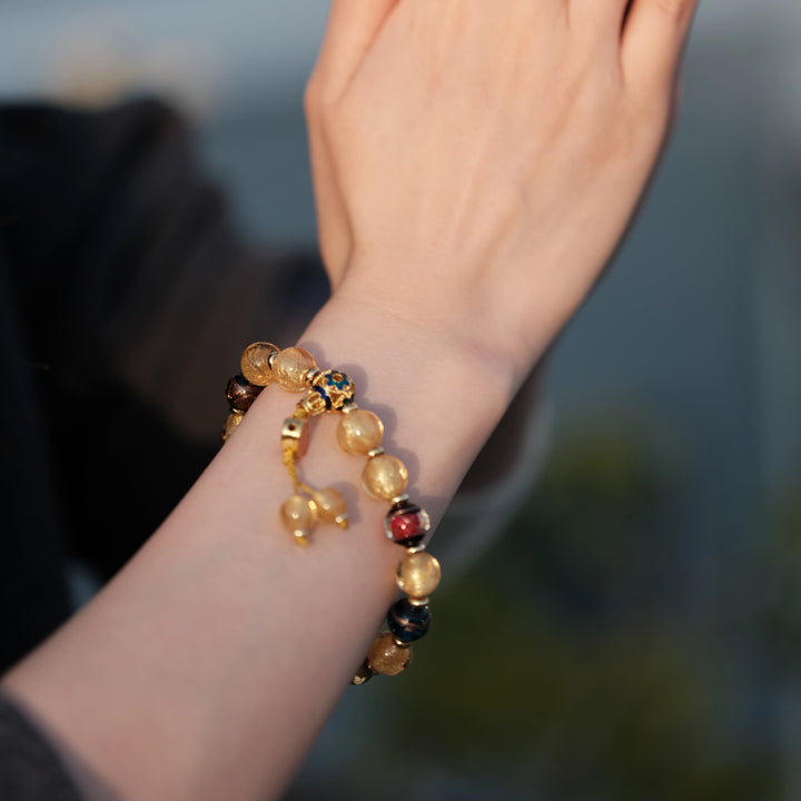 Radiant Wealth & Eternal Abundance — Luminous Golden Prosperity Charm Bracelet