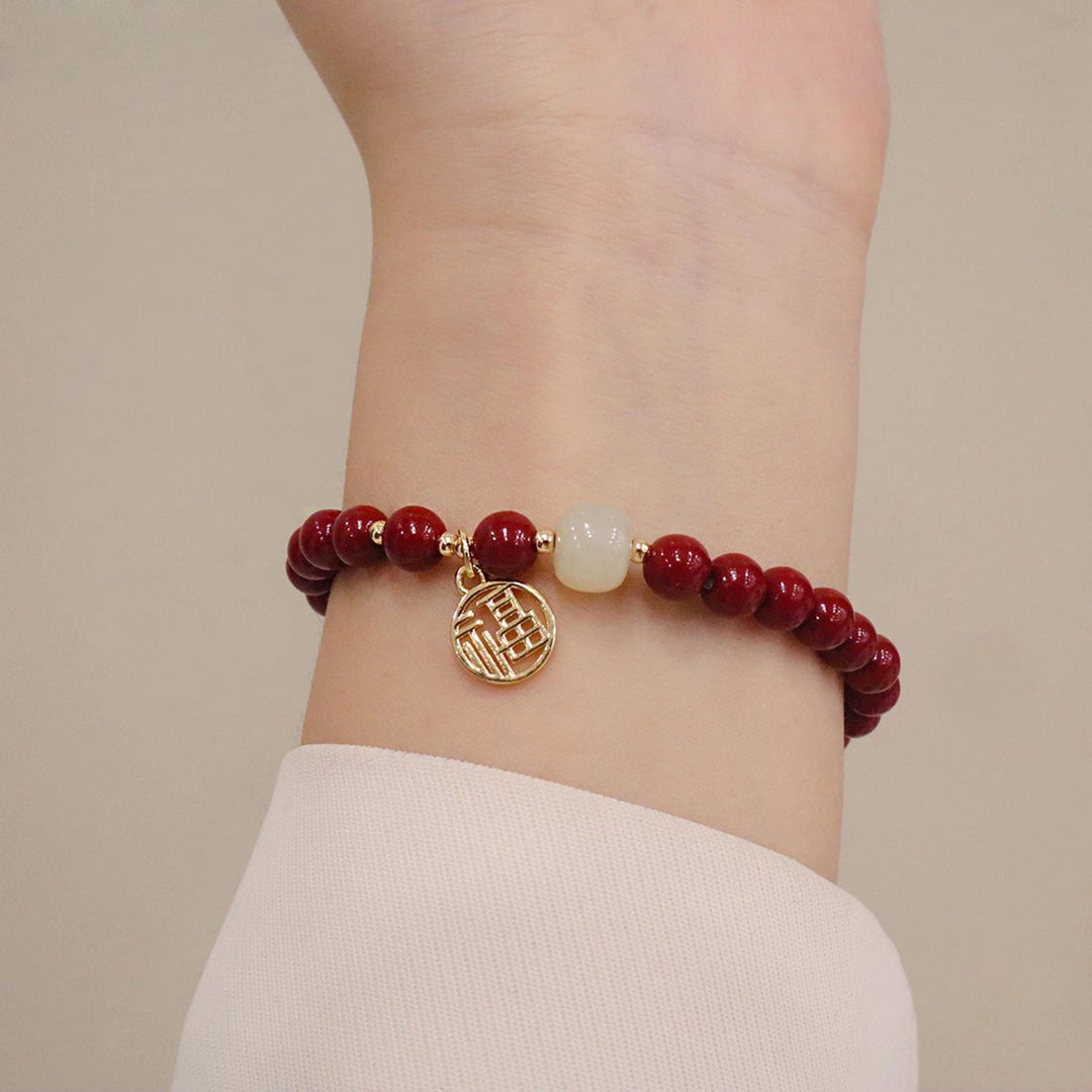 Red Crystal & Jade Bracelet – “Fu” Charm for Feminine Blessings