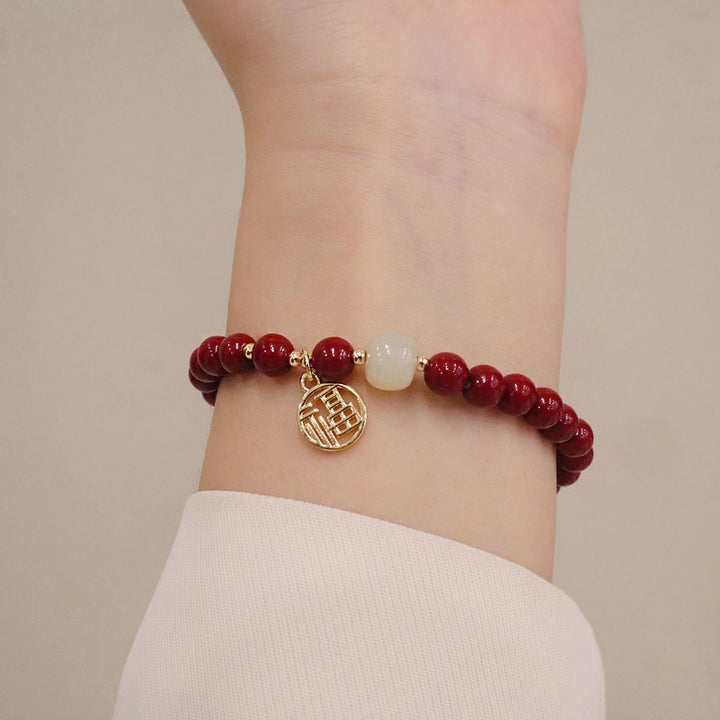 Red Crystal & Jade Bracelet – “Fu” Charm for Feminine Blessings
